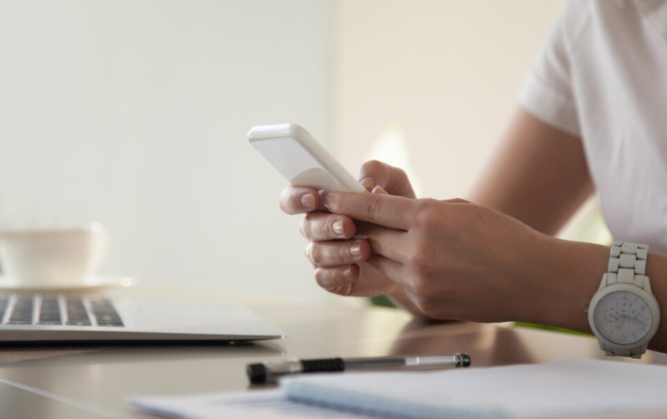 businesswoman looking important contact phone