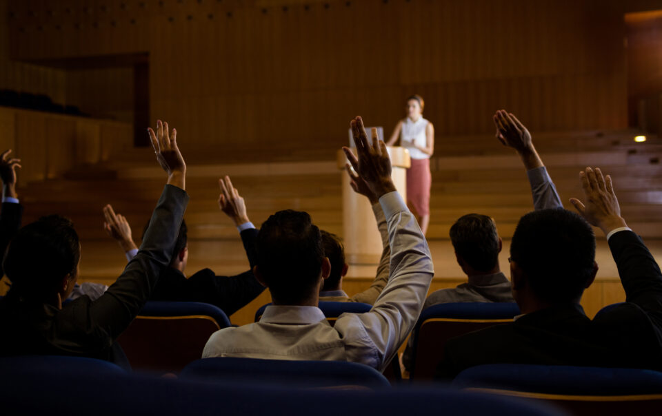 female business executive giving a speech