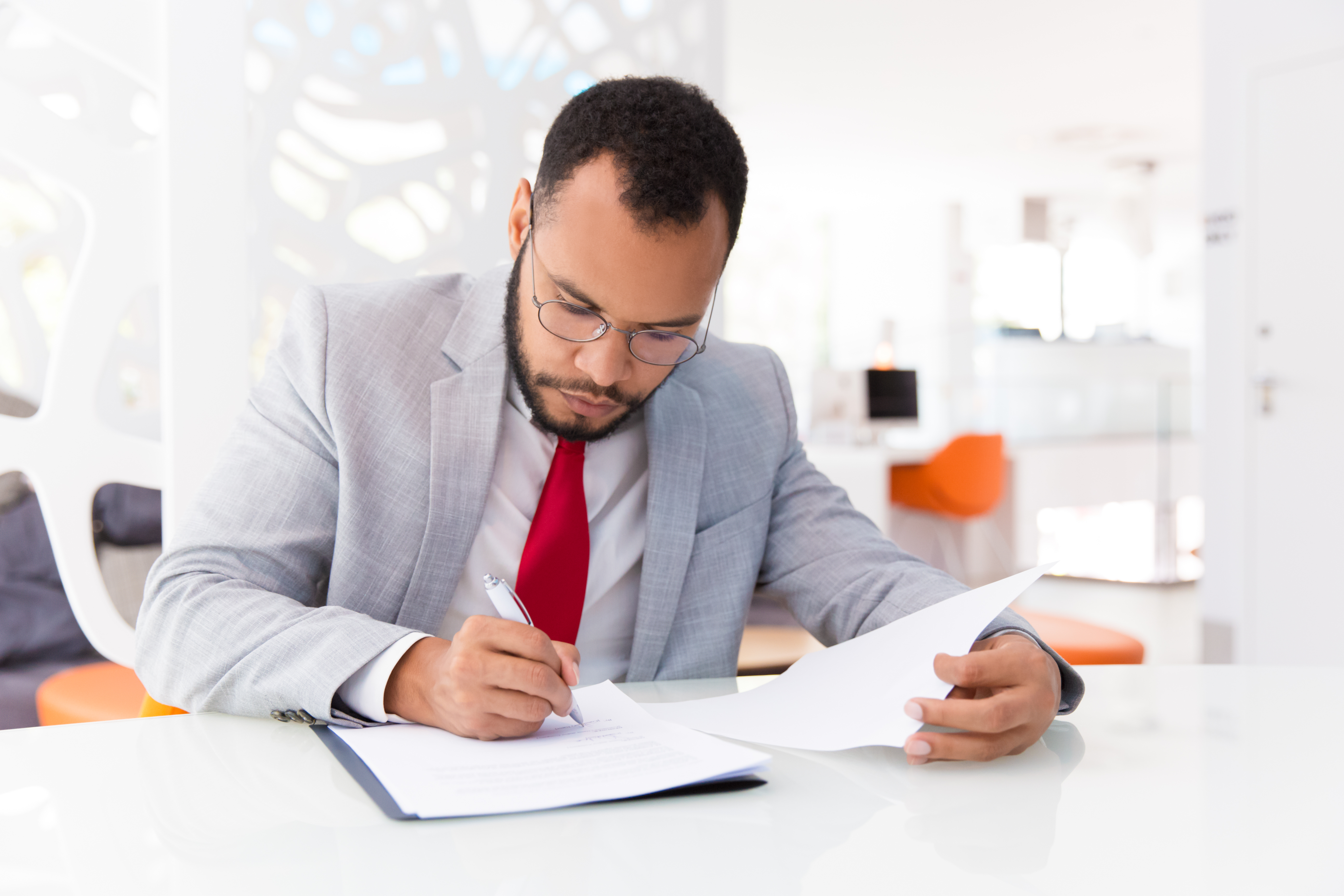 focused auditor checking document