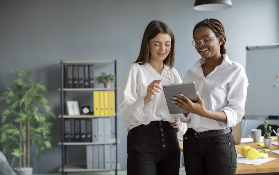 beautiful women working together in a startup company