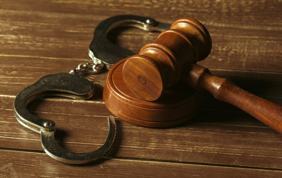 closeup view of brown wooden mallet of judge