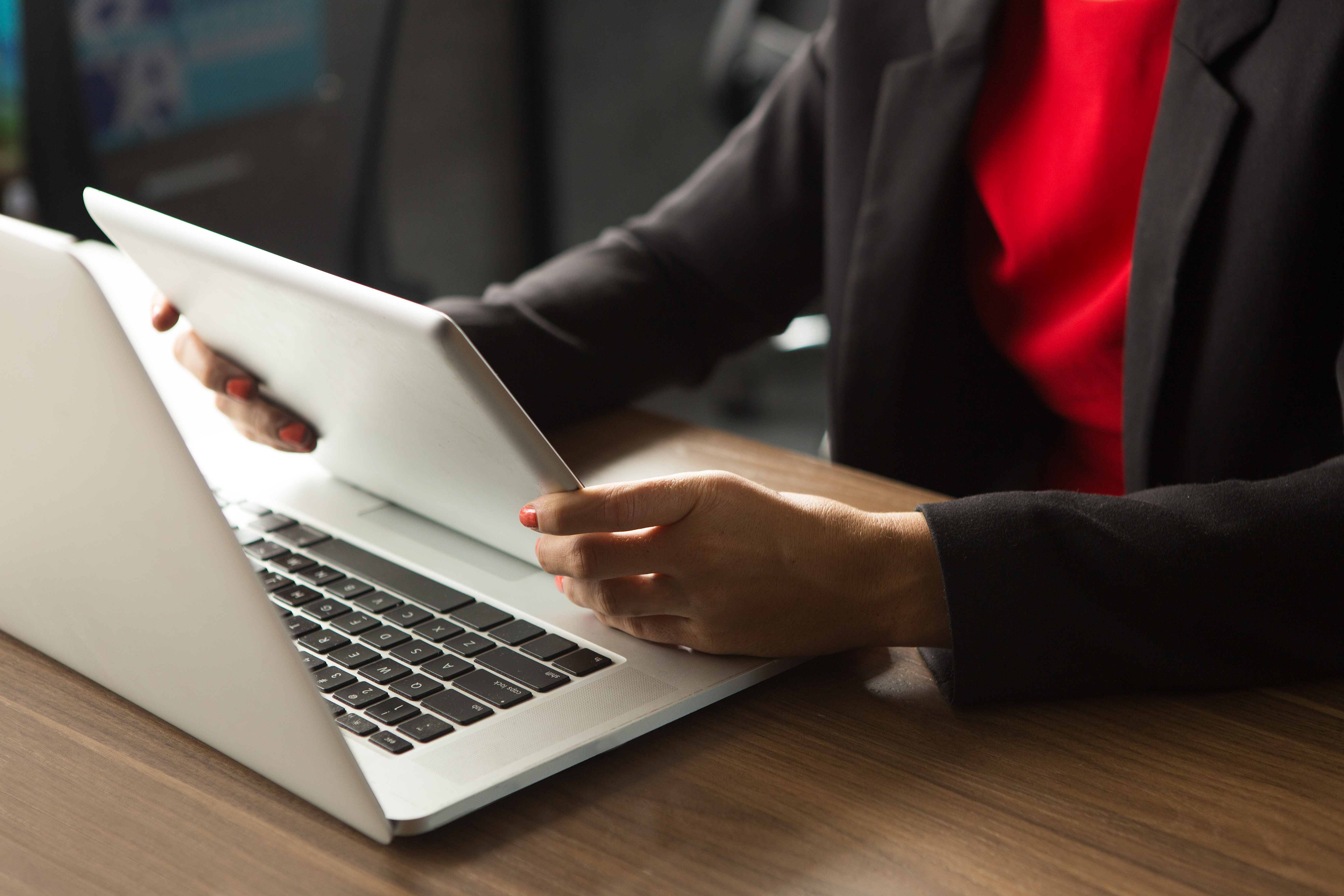 businesswoman working with laptop and touchpad