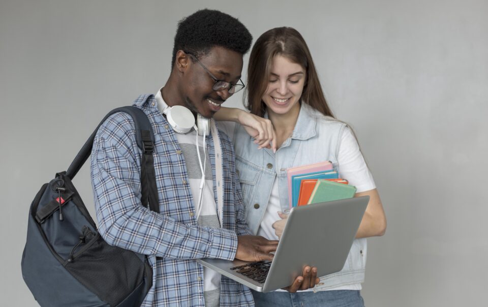 students with laptop medium shot