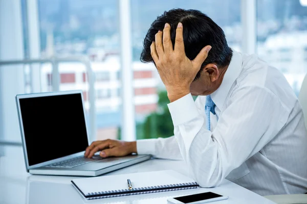 depositphotos 97094286 stock photo worried businessman working at his