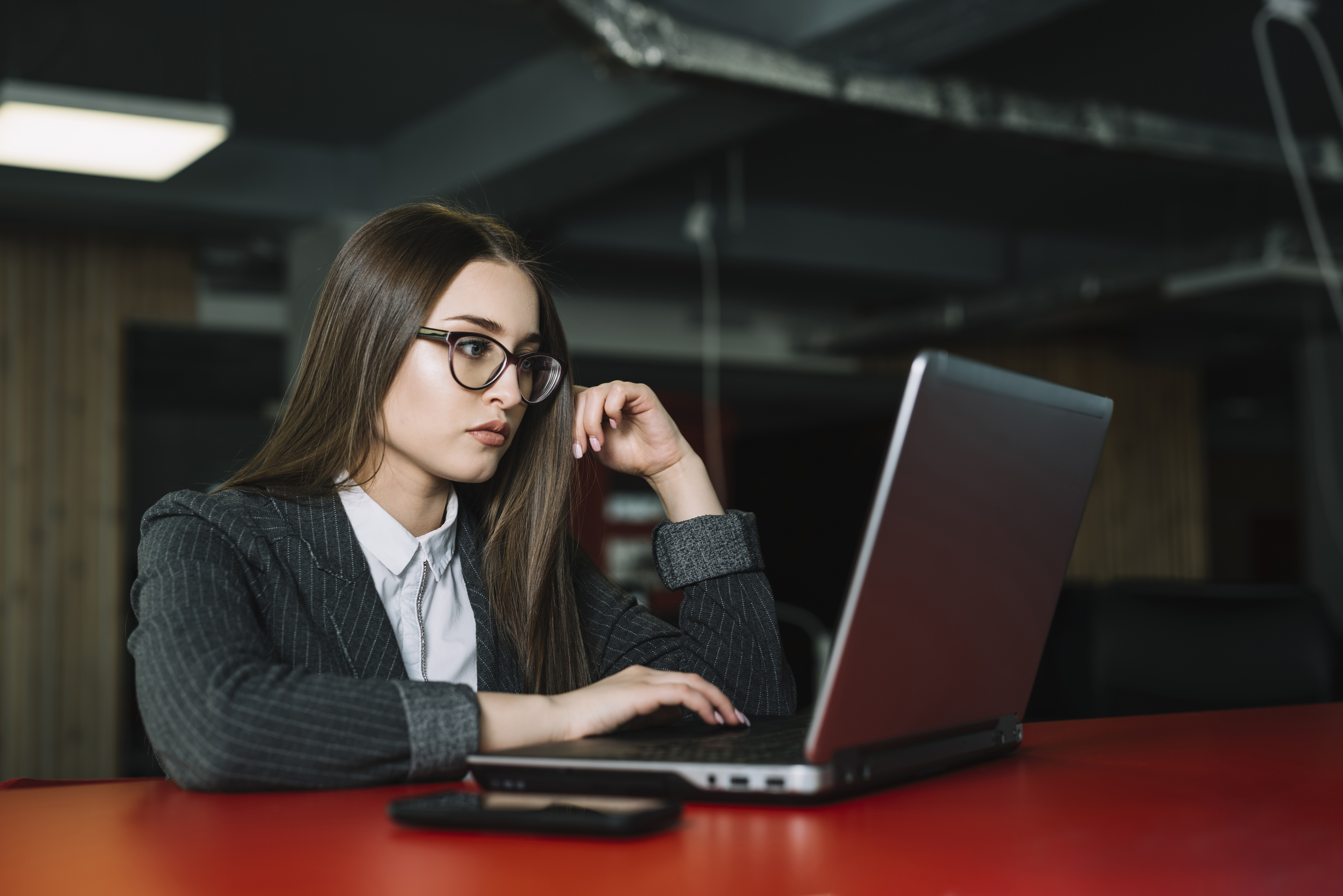 young business woman using laptop table