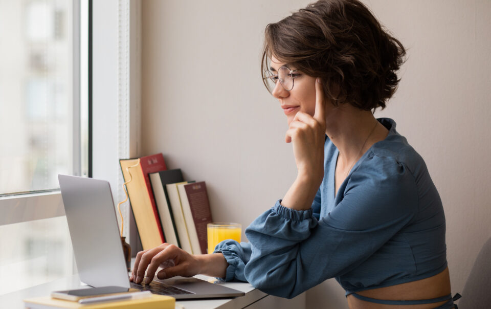 beautiful young woman working laptop