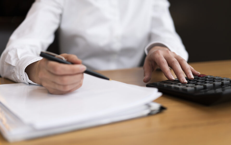 businessman doing calculations office